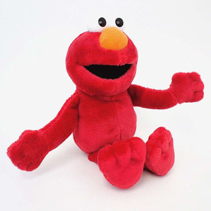 Seated Elmo plush beanbag toy with red fur and orange nose