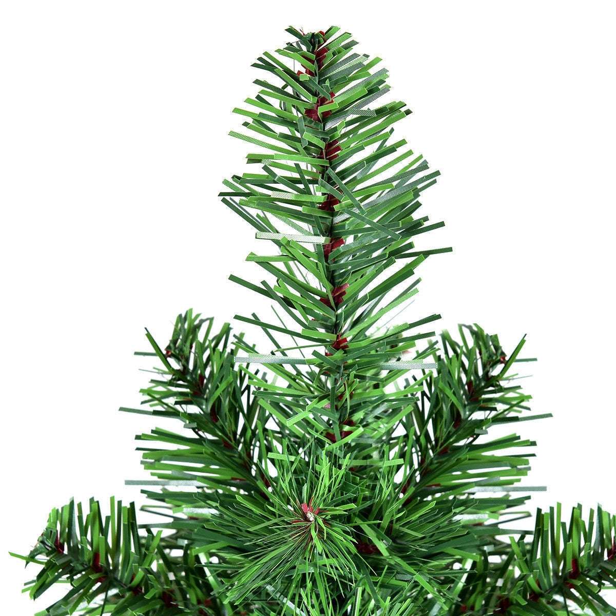Close-up of layered green PVC branches on the artificial Christmas tree