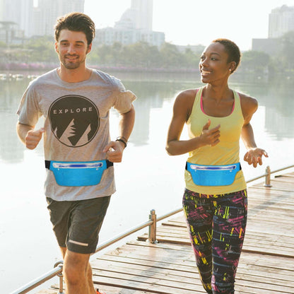 Blue waist pack belt worn by a runner, featuring a zip front pocket