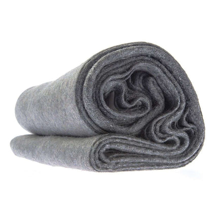 Gray wool blanket, tightly rolled with soft felted texture and layered edge