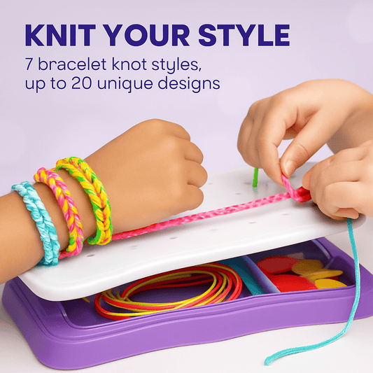 Bracelet making kit with purple tray and white board as hands tie a pink cord bracelet