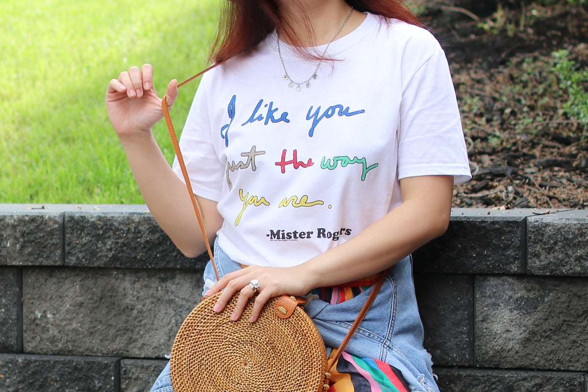 White Mister Rogers quote T-shirt worn with casual jeans