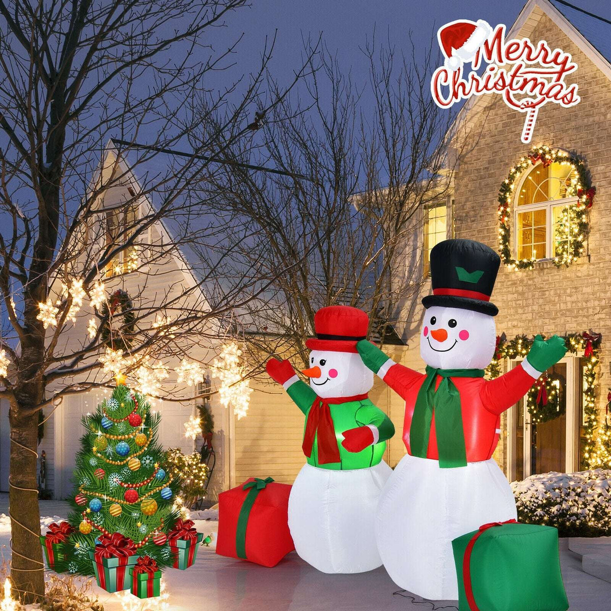 Inflatable snowman pair with red and green outfits and gift boxes, shown outdoors