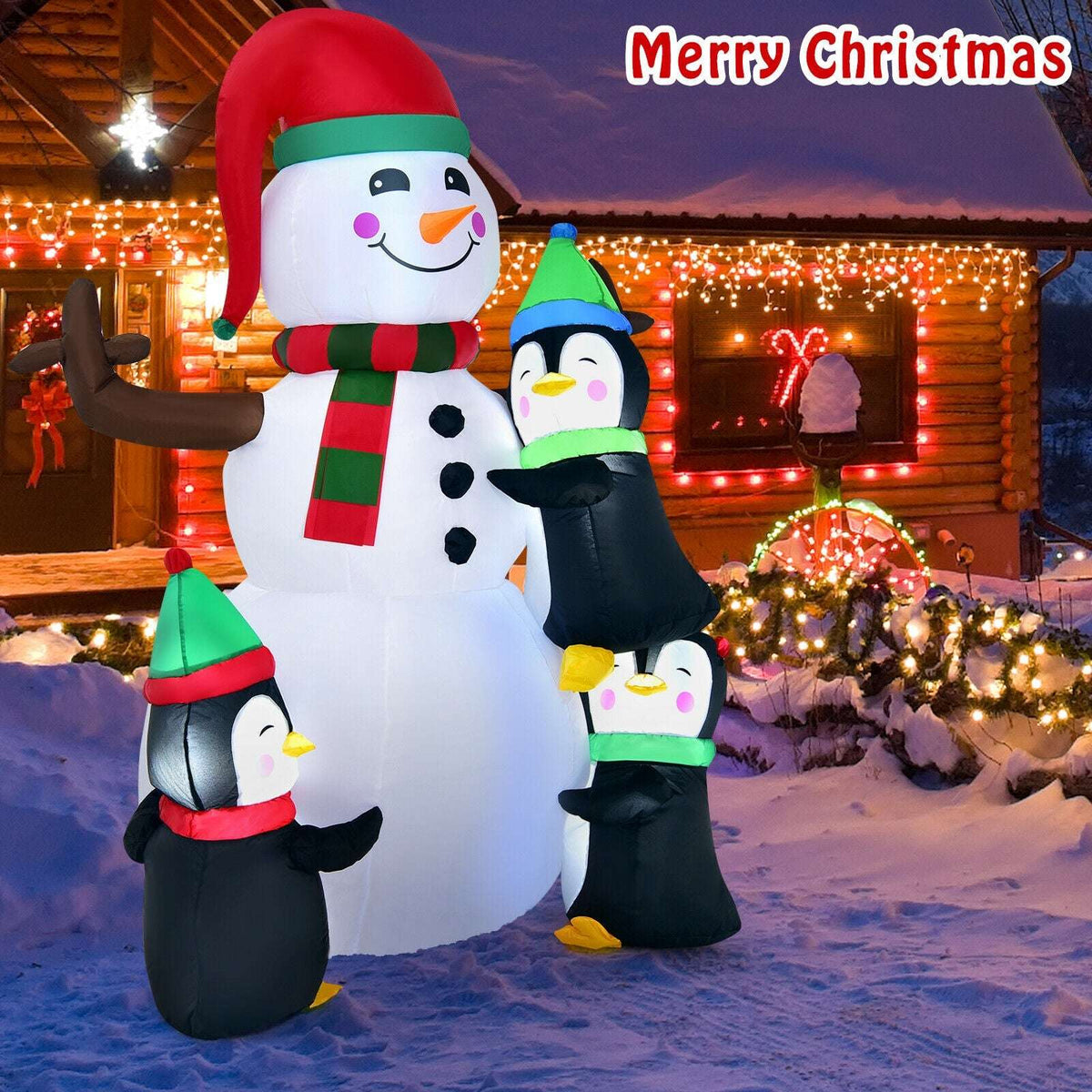Inflatable snowman with three penguins, shown from a closer angled view
