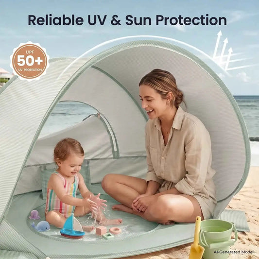 Green beach tent with arched UPF50+ sunshade and front splash area for toddlers