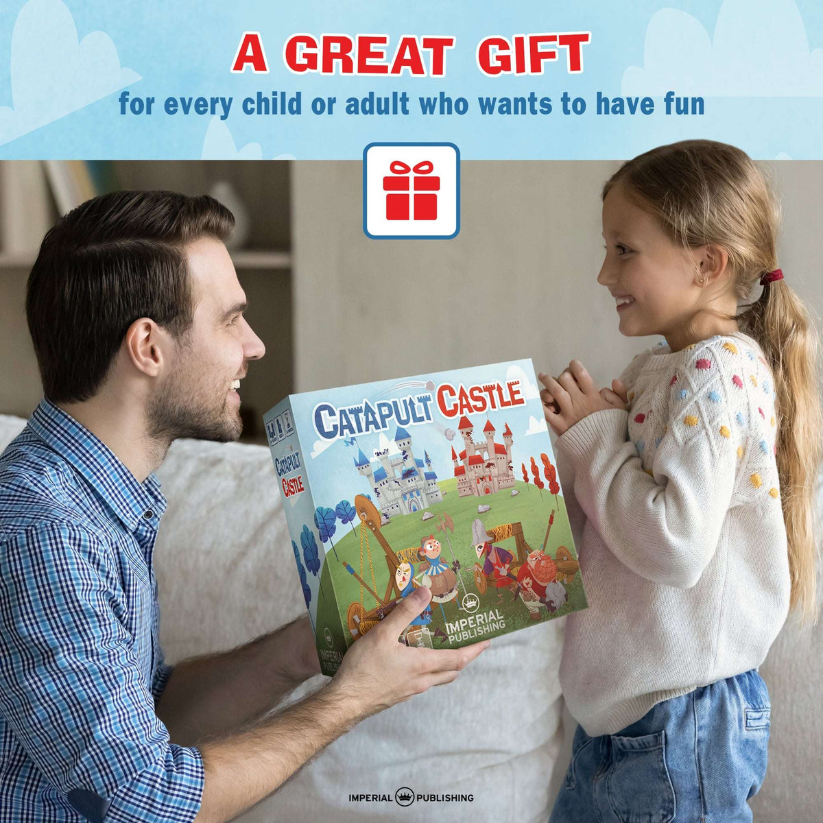 Catapult Castle board game box held by child and parent, featuring castle and catapult theme