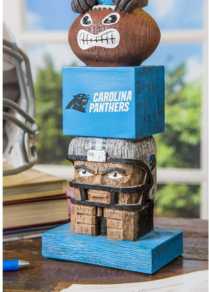 Carolina Panthers tiki totem garden statue showing skull face and stacked brick blocks