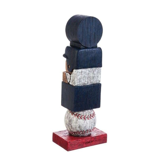 Hand-painted tiki totem garden statue, rear view, dark blue and white figures