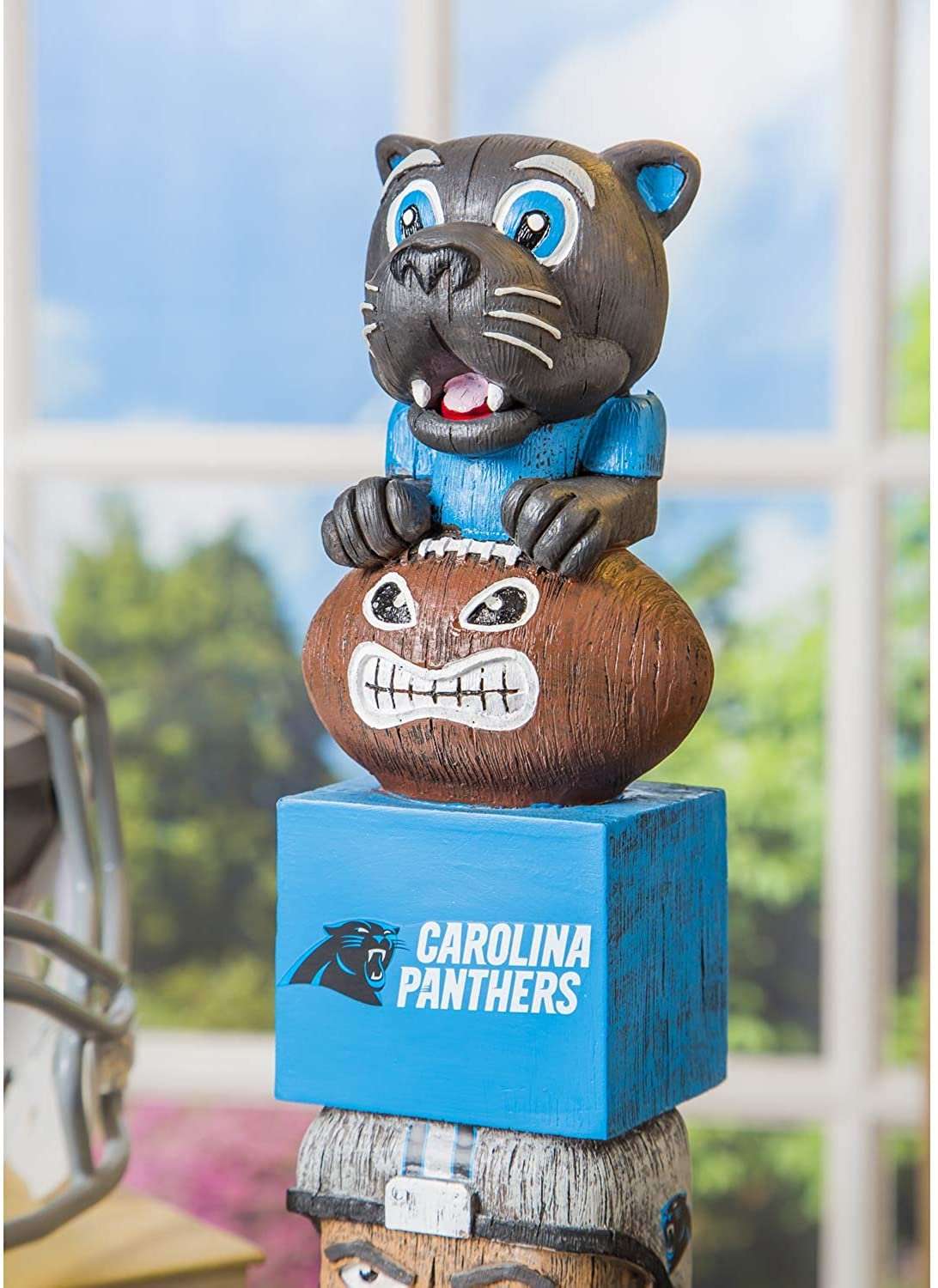 Carolina Panthers tiki totem garden statue front view with cat, skull face, and stacked blocks