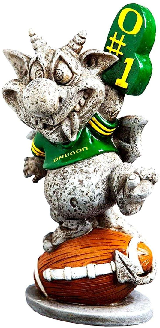 University of Oregon Ducks garden statue of a dog in green and holding a ball