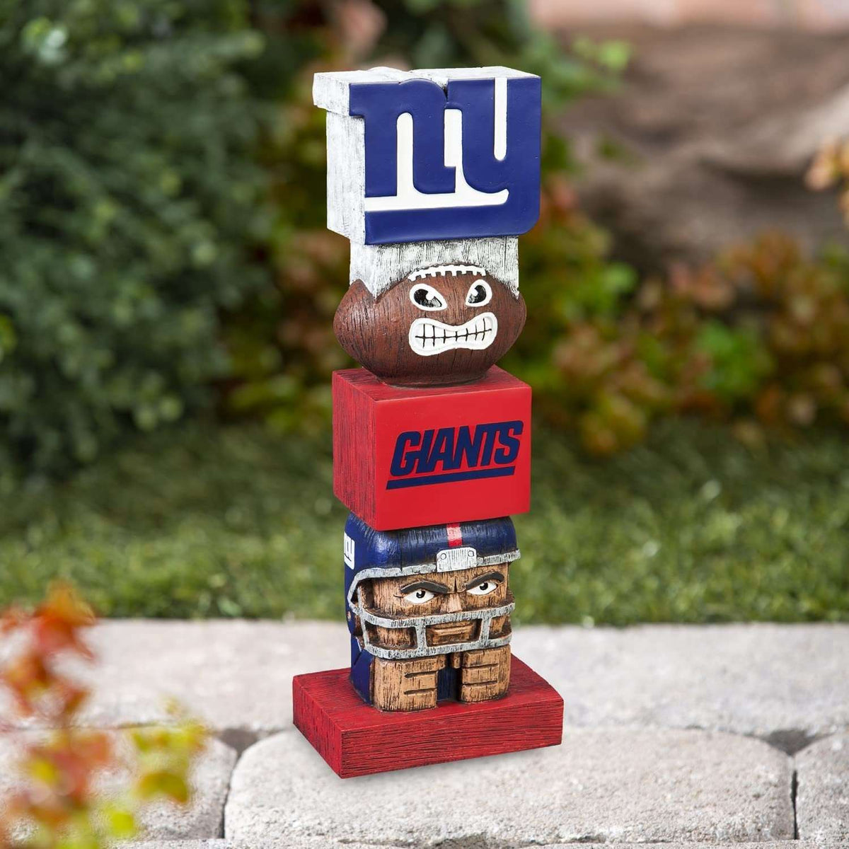 New York Giants resin tiki totem standing outdoors on red base