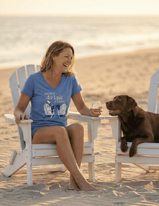 Women's blue V-neck T-shirt with 'Never Drink Alone' text graphic