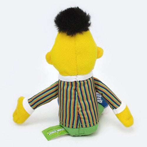 Back of Bert plush with striped shirt, green pants, and black hair