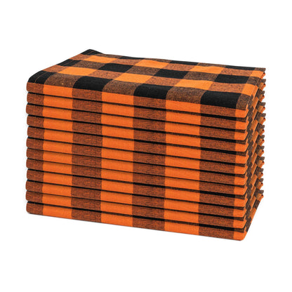 Set of 12 orange and black plaid cotton dinner napkins, folded stack