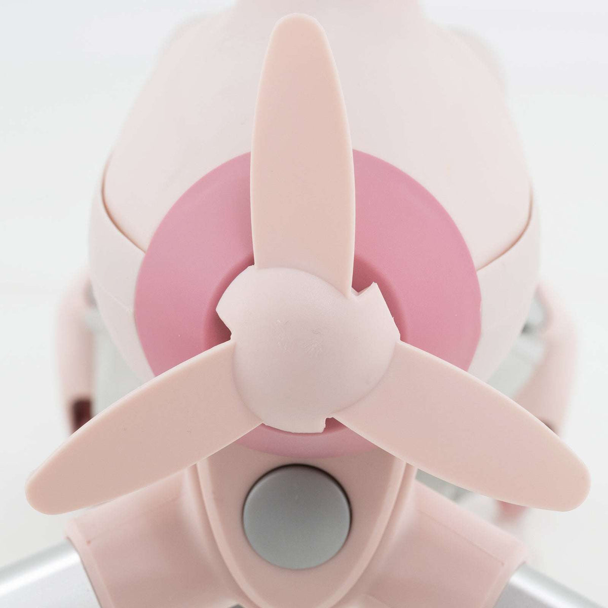 Pink ride-on push car front wheel/steering hub with fan-style design