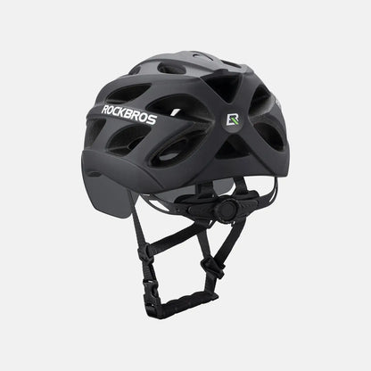 Dark bike helmet with visor and goggles, front view with ROCKBROS emblem