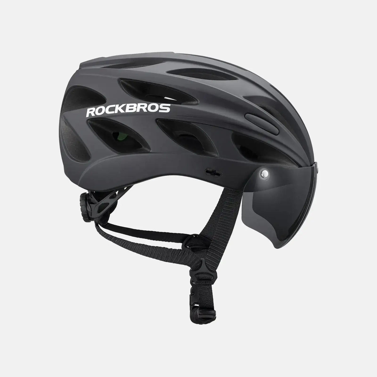 Dark bike helmet with visor and chin strap, ROCKBROS logo on side