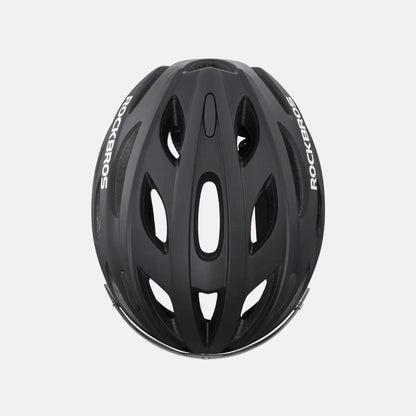 Black bike helmet without visor, smooth shell and ventilation channels