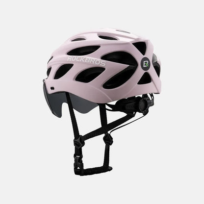 Bicycle helmet, light pink shell with vent openings and black chin strap