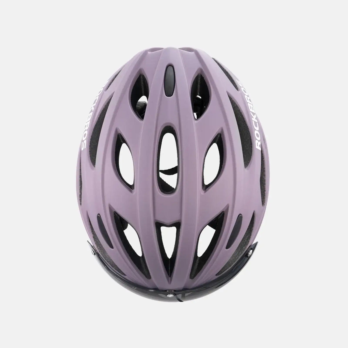 Lilac bike helmet with ventilation holes, smooth outer shell, top-down view