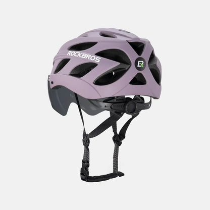 Lilac bike helmet with visor and retention straps, rear side view
