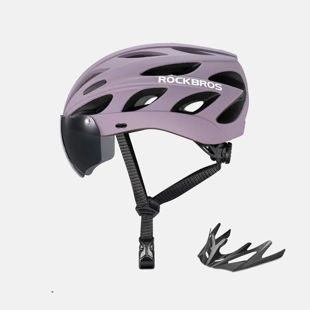 Lilac bike helmet with clear visor and attached goggles, includes extra goggle piece