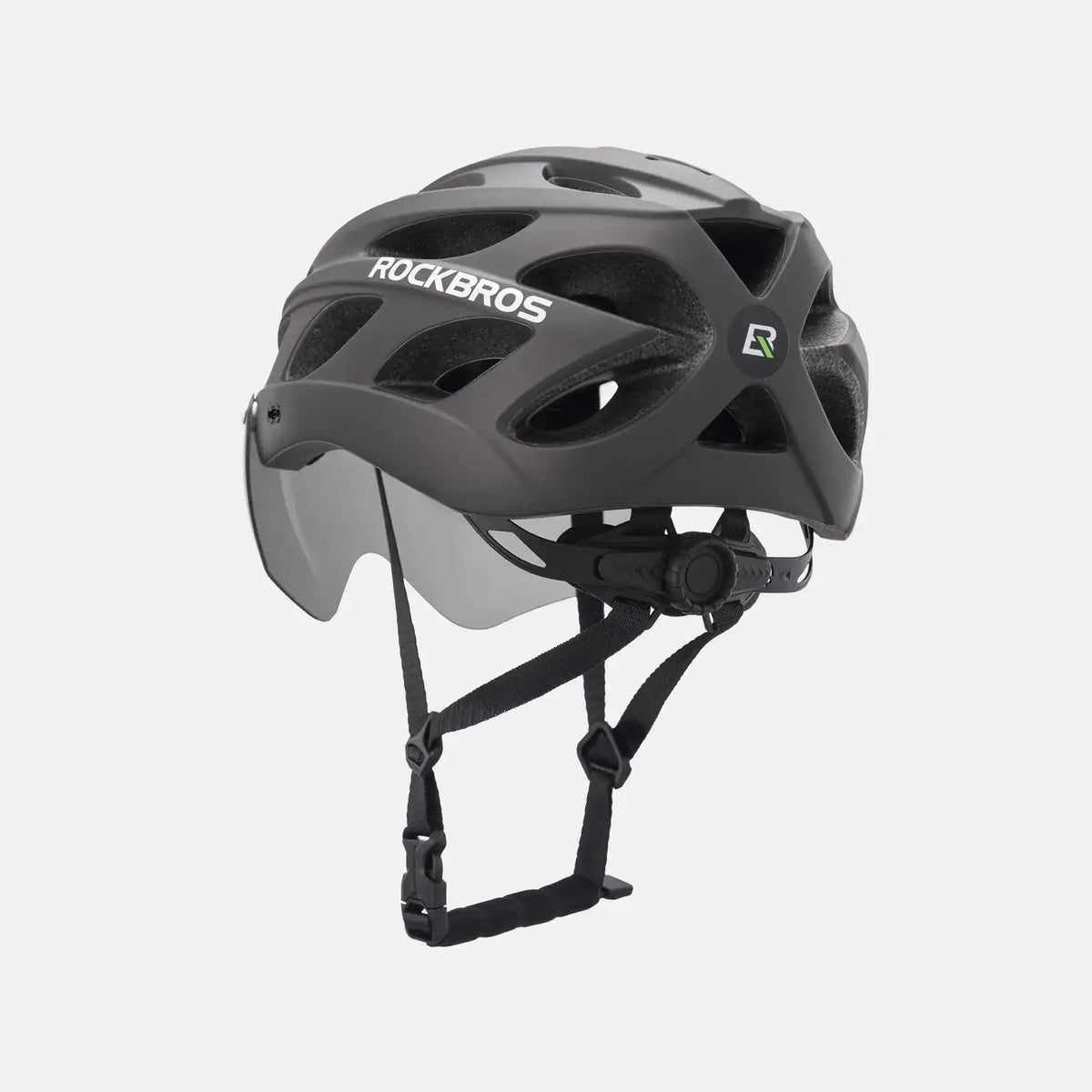 Matte gray bike helmet with integrated visor and adjustable chin straps