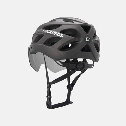 Matte gray bike helmet with integrated visor and adjustable chin straps