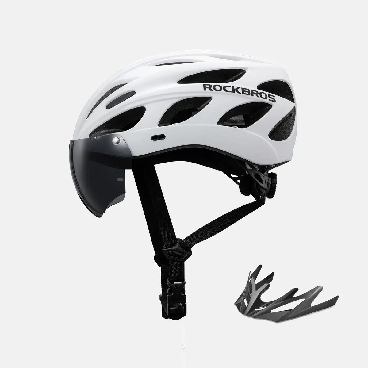 White bike helmet with clear visor and attached goggles, includes extra goggle piece