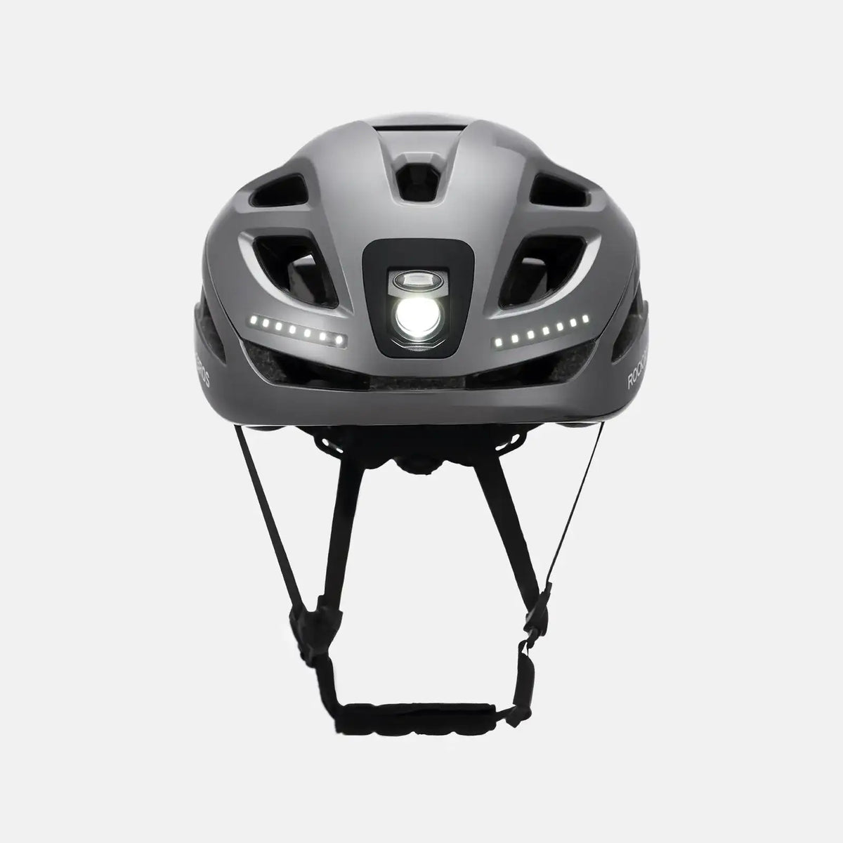 ROCKBROS bike helmet in light gray with front white LED and side light bars