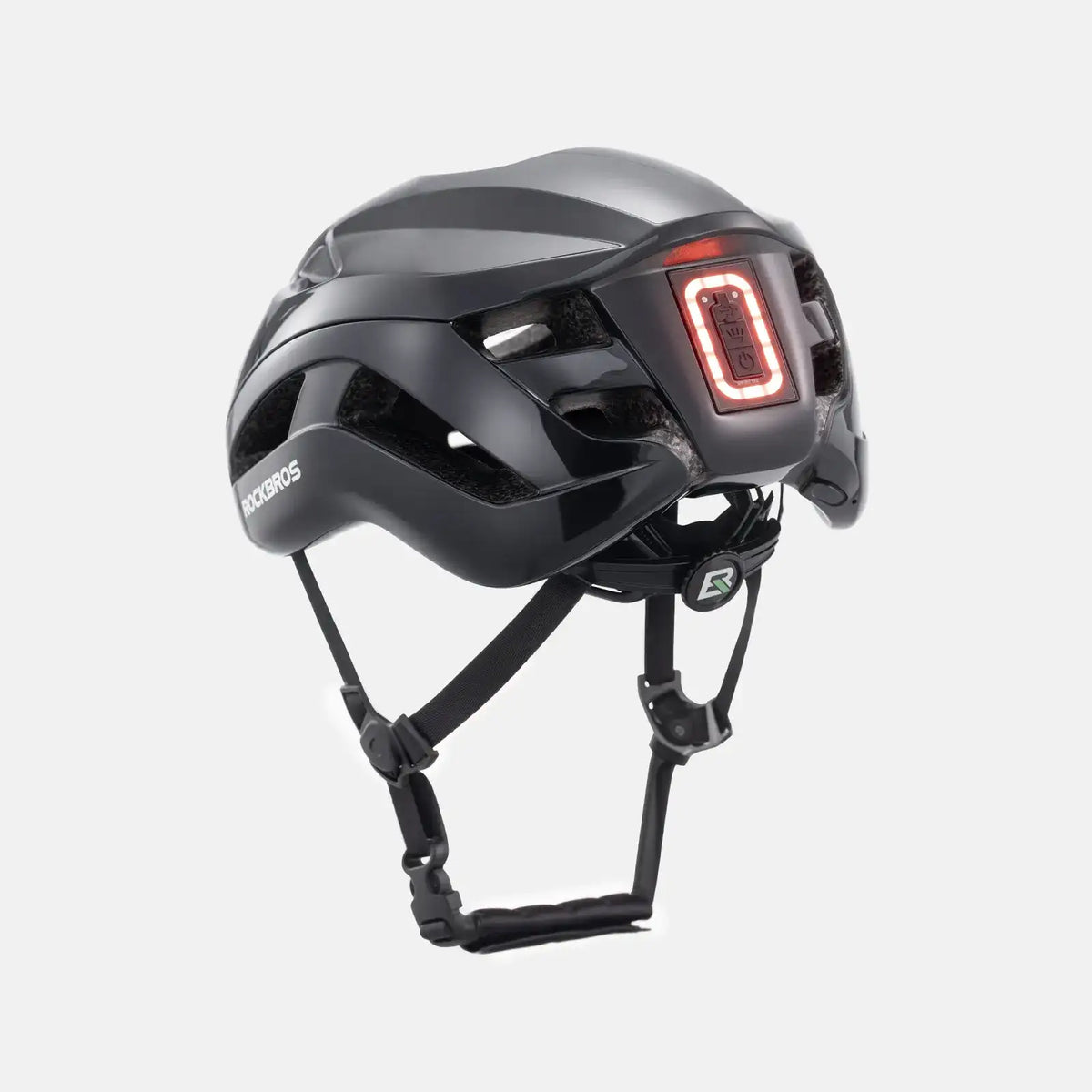 ROCKBROS bike helmet with LED lights, dark shell with red rear light panel and straps