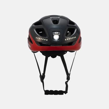 Black-and-red bike helmet with front white LED light and front vents, front view.