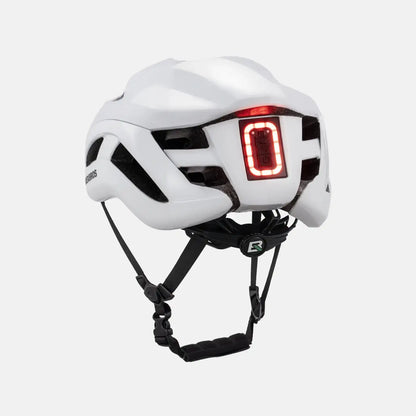 White bike helmet with glowing red LED rear light and black chin straps