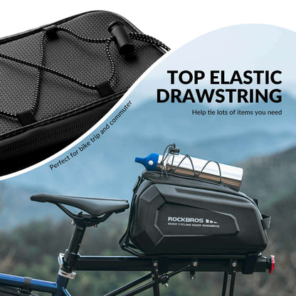 Black bike trunk bag with textured hard shell and top elastic drawstring