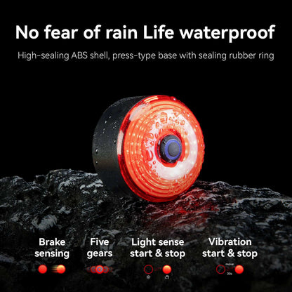 Waterproof hard shell bike saddle bag with bright red LED tail light, black