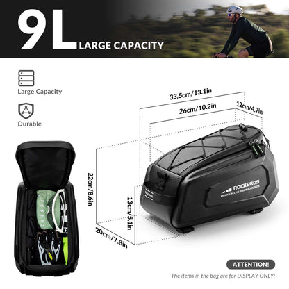 Black hard-shell rear rack bike trunk bag with front handle and molded panels