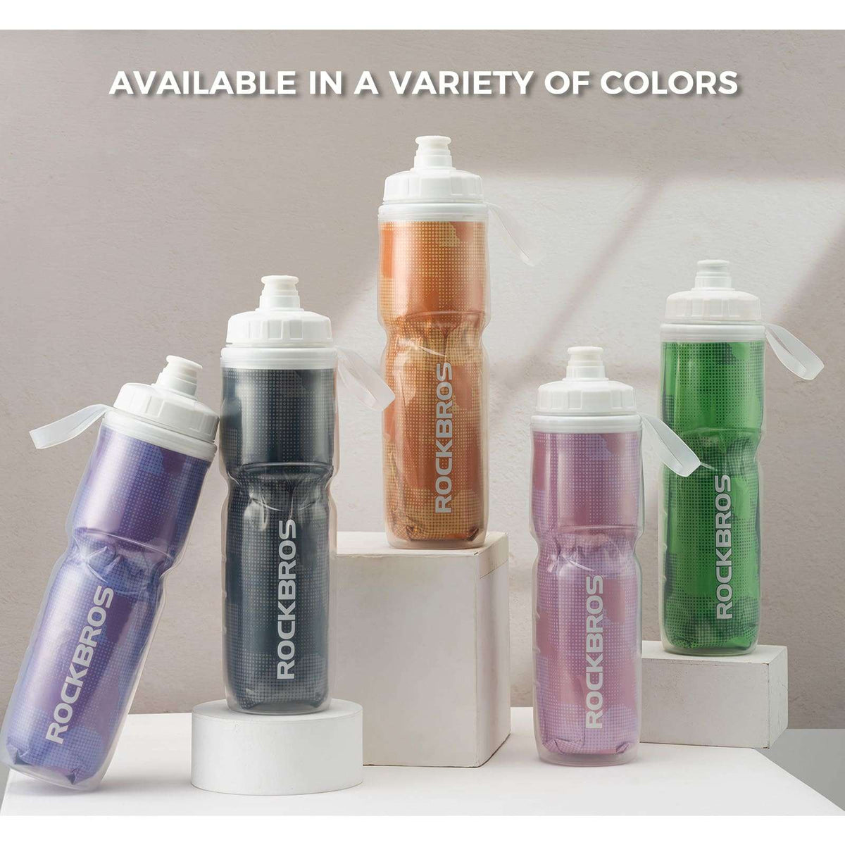 Assorted color insulated bike water bottles with flip spouts and carry handles
