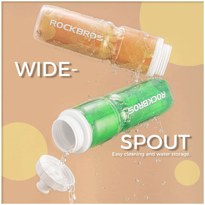 Green and orange insulated bike water bottles with wide spouts, pouring water