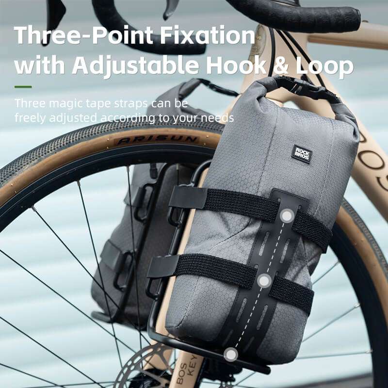 Gray front fork rack bag with three-point fixation and adjustable hook-and-loop straps