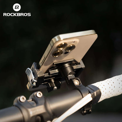 Close-up of bike phone mount base and pivot hardware for stable handlebar attachment
