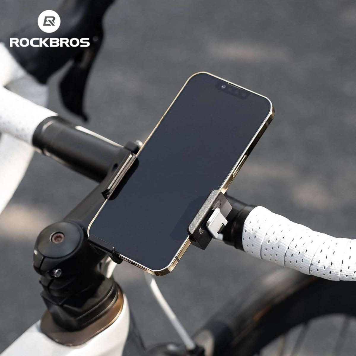 ROCKBROS bike phone mount holding a smartphone on the handlebar with metal clamp