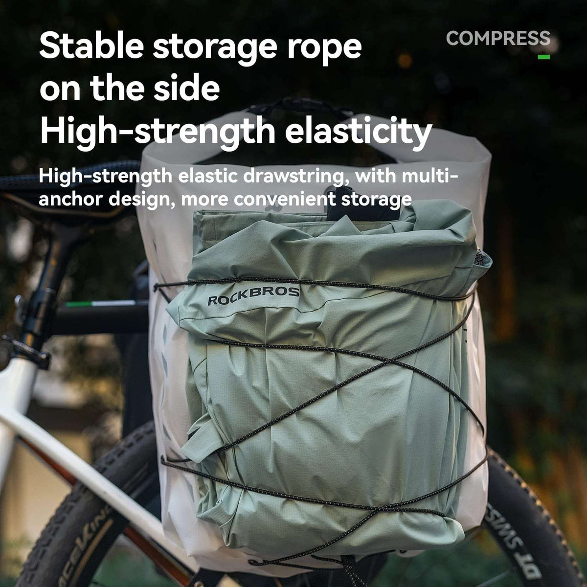 Light green bike rack bag with side elastic drawstring and cross straps