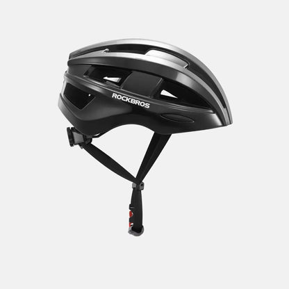 Black bike helmet, side view with vent panels and adjustable chin strap