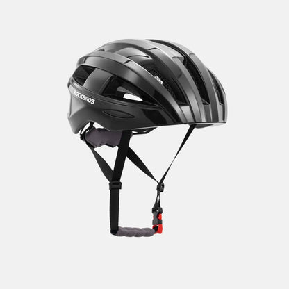 Black bike helmet with adjustable chin straps and rear light housing