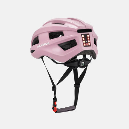 Pink bike helmet with rear LED light showing on the back