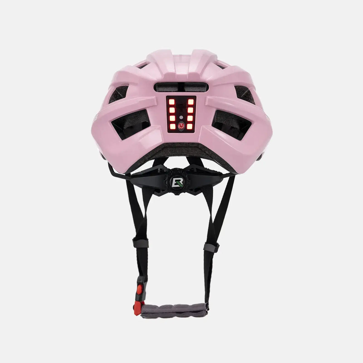 Pink bike helmet with rear LED light glowing on the back