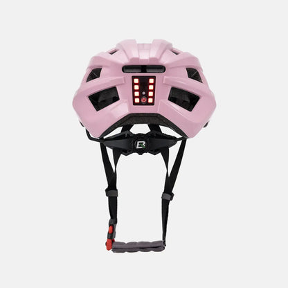 Pink bike helmet with rear LED light glowing on the back