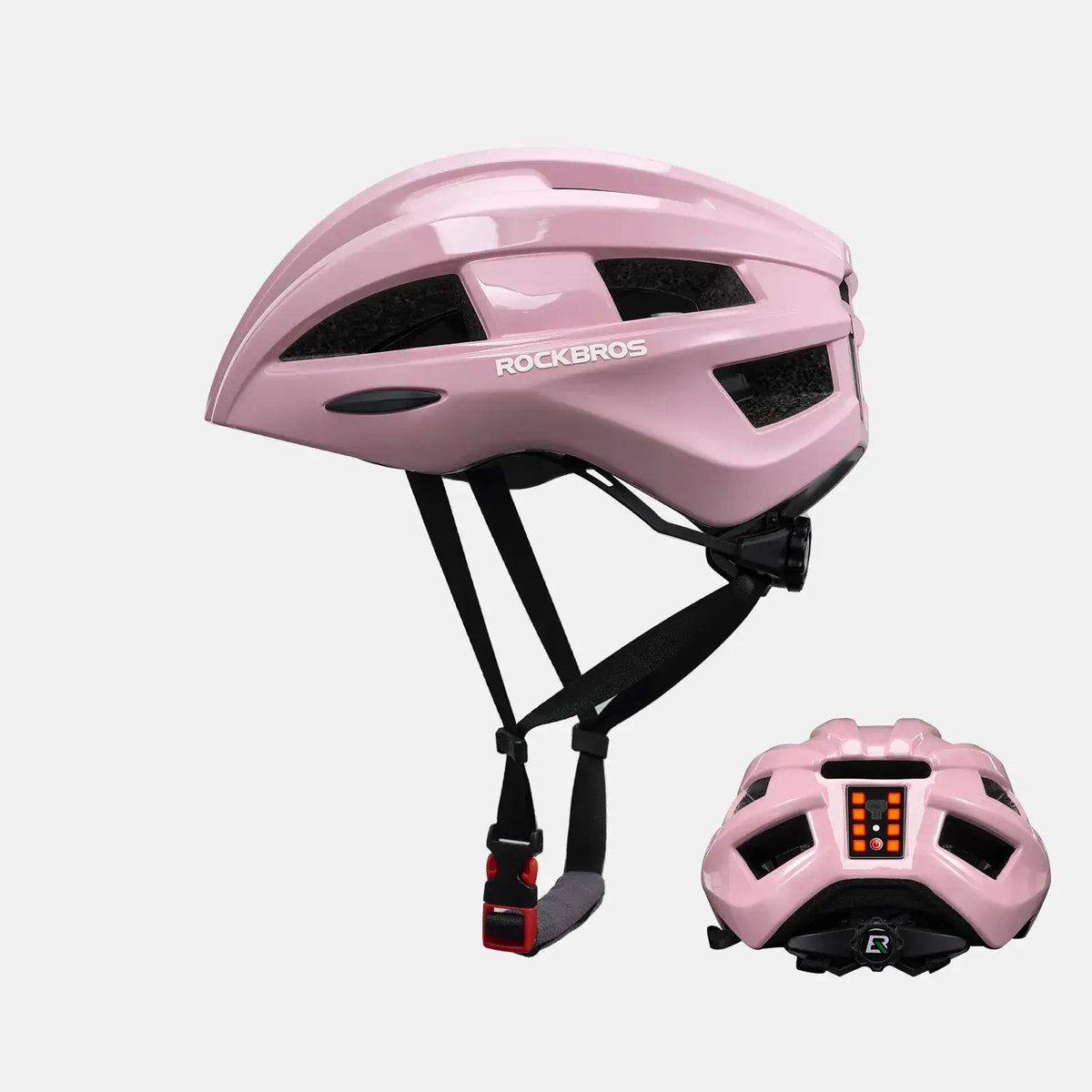 Pink bike helmet with rear LED light and adjustable chin straps