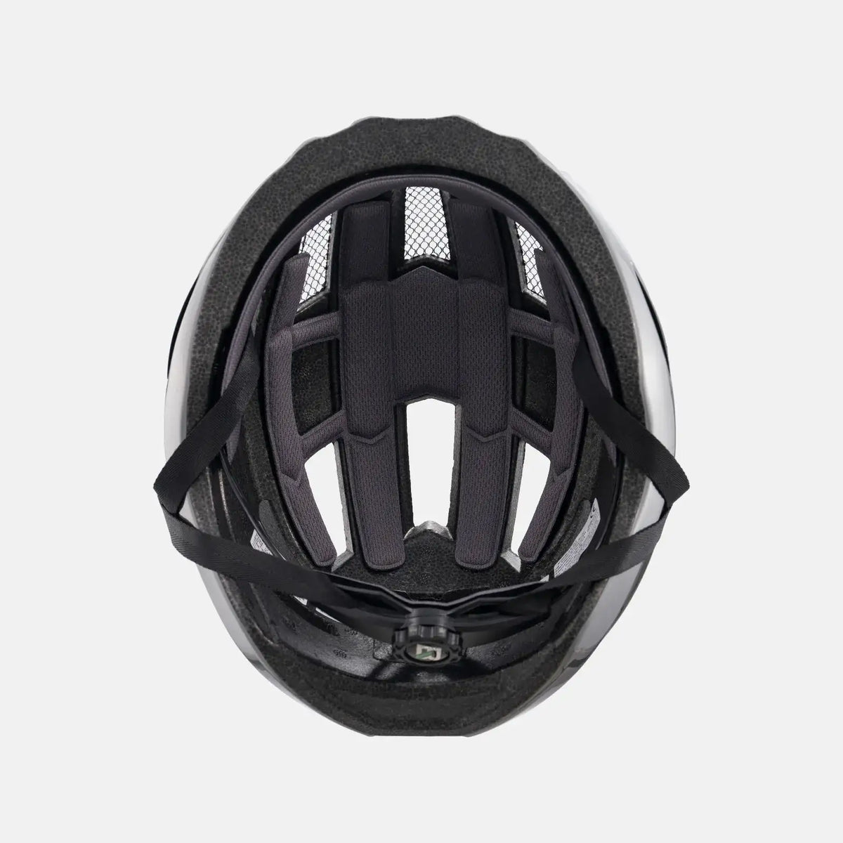 Black and light gray bike helmet interior with padding and vent openings