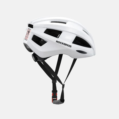 White bike helmet with rear LED strip, vents, and adjustable chin strap